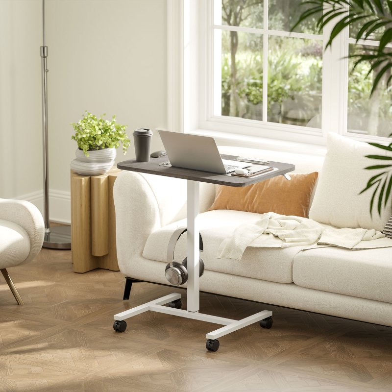 HOMCOM Height Adjustable Standing Desk, Pneumatic Sit Stand Desk for Laptop, Mobile Overbed Table with Wheels and Headphone Hook for Home Office