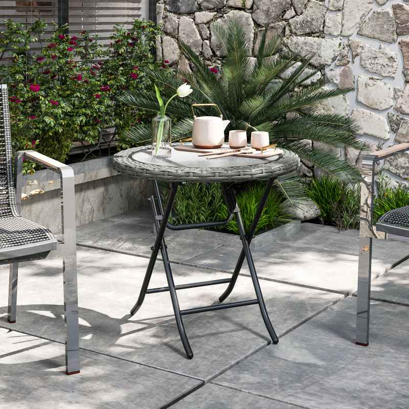 Outsunny Folding Rattan Garden Dining Table, 68 cm Round Rattan Garden Table with Water Ripple Tempered Glass Top, Wicker Edging  and Steel Frame for Outdoor, Patio, Grey