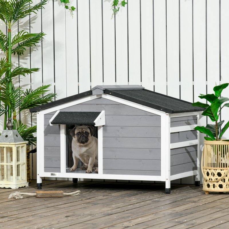 PawHut Wooden Dog Kennel Outdoor, Elevated Dog House for Outside, with Openable Top, Asphalt Roof, Windows, Curtain, Removable Tray, Adjustable Legs, 65H x 97L x 72Wcm, Grey